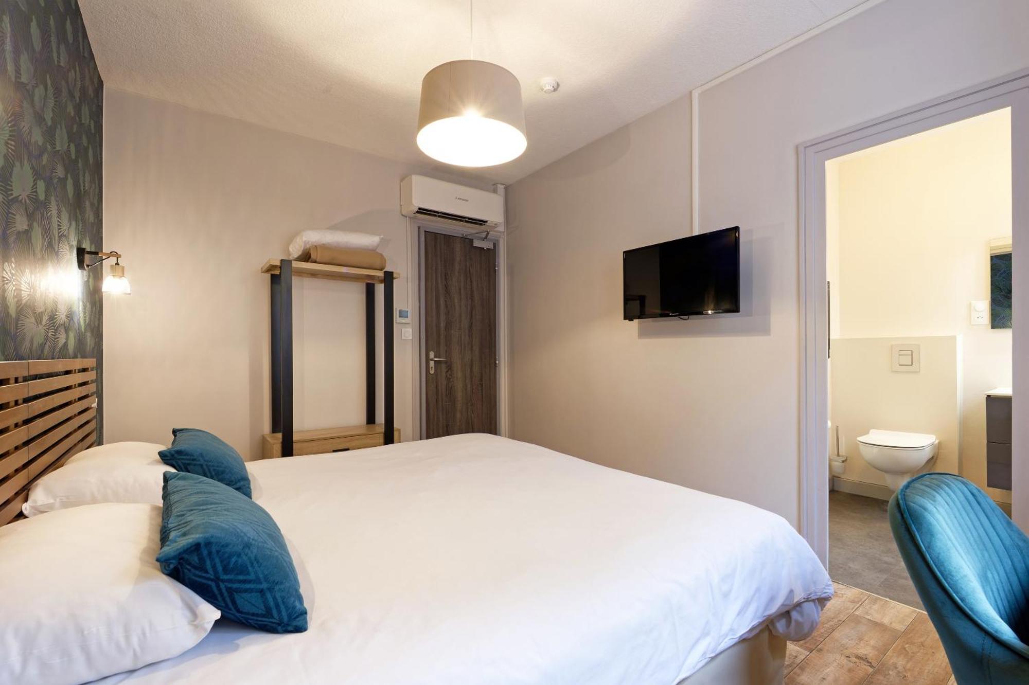 Contact Hotel Du Commerce Et Son Restaurant Cote A Cote Autun Zimmer foto