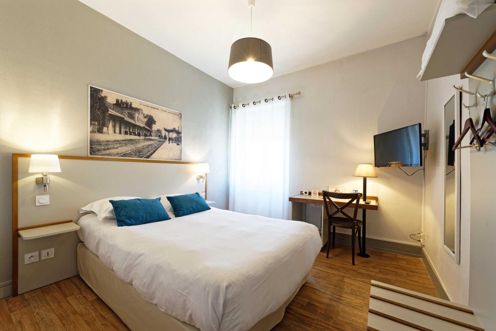 Contact Hotel Du Commerce Et Son Restaurant Cote A Cote Autun Zimmer foto