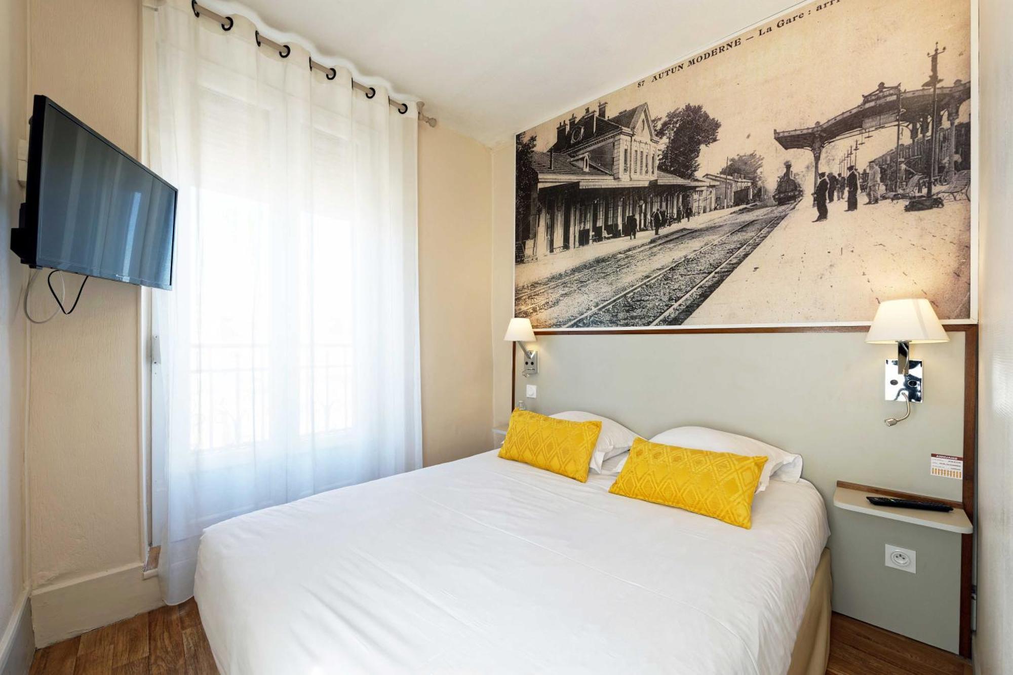 Contact Hotel Du Commerce Et Son Restaurant Cote A Cote Autun Zimmer foto